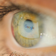 Stock photo of eye with Google search page reflected in it